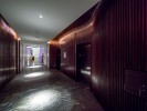 Conrad Hotel Elevator Lobby - a tunnel of bent walnut, fabricated by Pure Timber
